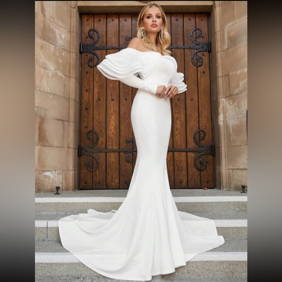 Off shoulder ruffle edge and floor length wedding dress
